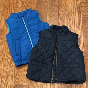 Two toddler vests